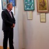 автор виставки Петро Грицюк під час її відкриття декламує власні вірші